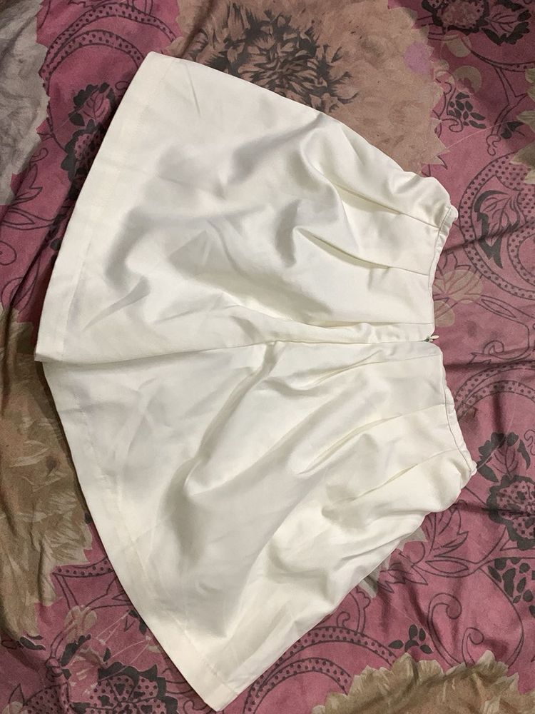 Cream High-Waisted Pleated Shorts