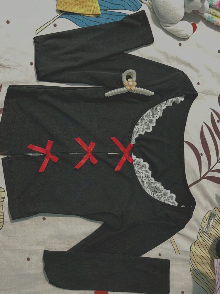 Chic Black Long Sleeve Top with Red Bows