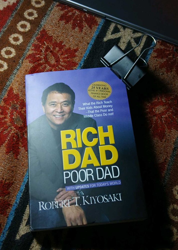 Rich Dad Poor by Robert T. Kiyos