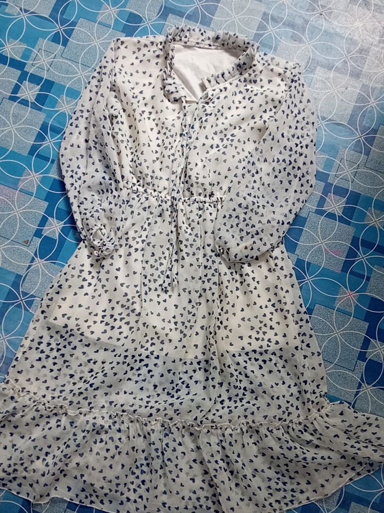 This Midi In White Color Georget Fabric.... Looking Cool Must Buy It