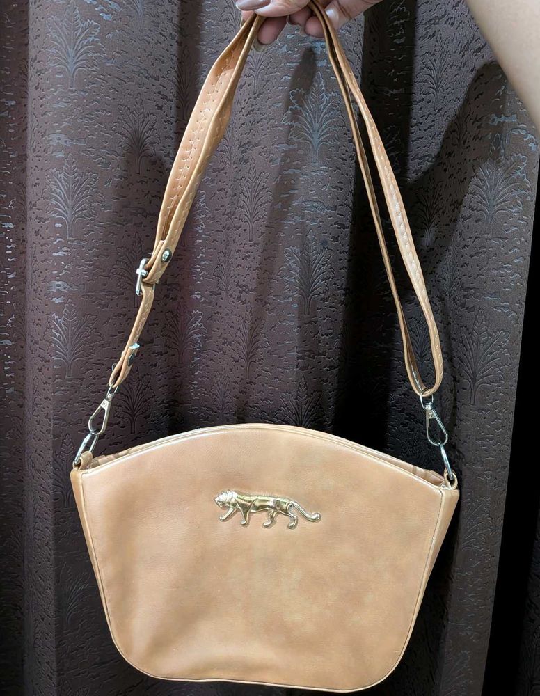 Chic Tan Shoulder Bag with Tiger Emblem