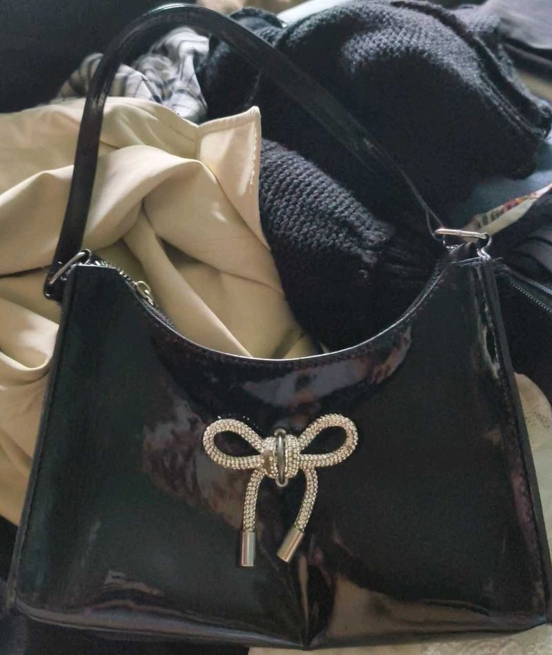 Chic Black Shoulder Bag with Fun Charm