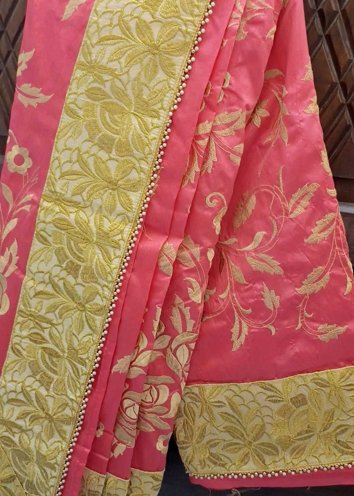 Elegant Pink Embroidered Saree with blouse piece