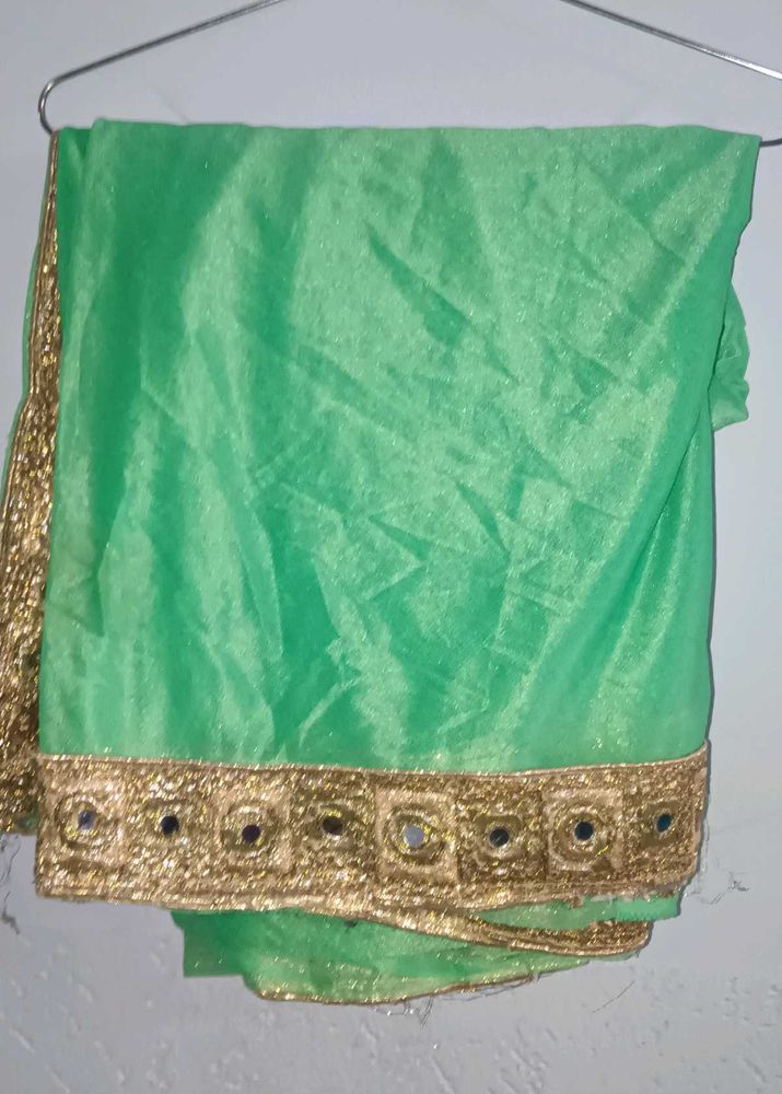 Heavy Green Saree with Golden Border