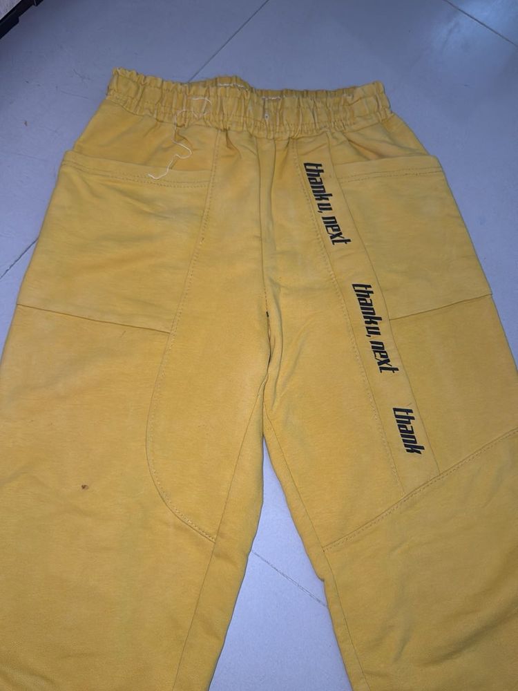 Yellow Sweatpants with "thank u, next" graphic