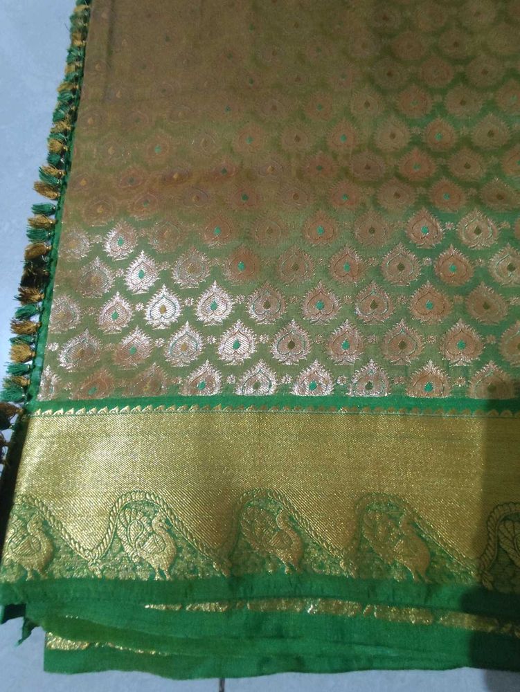 Elegant Green Silk Blouse with Gold Border