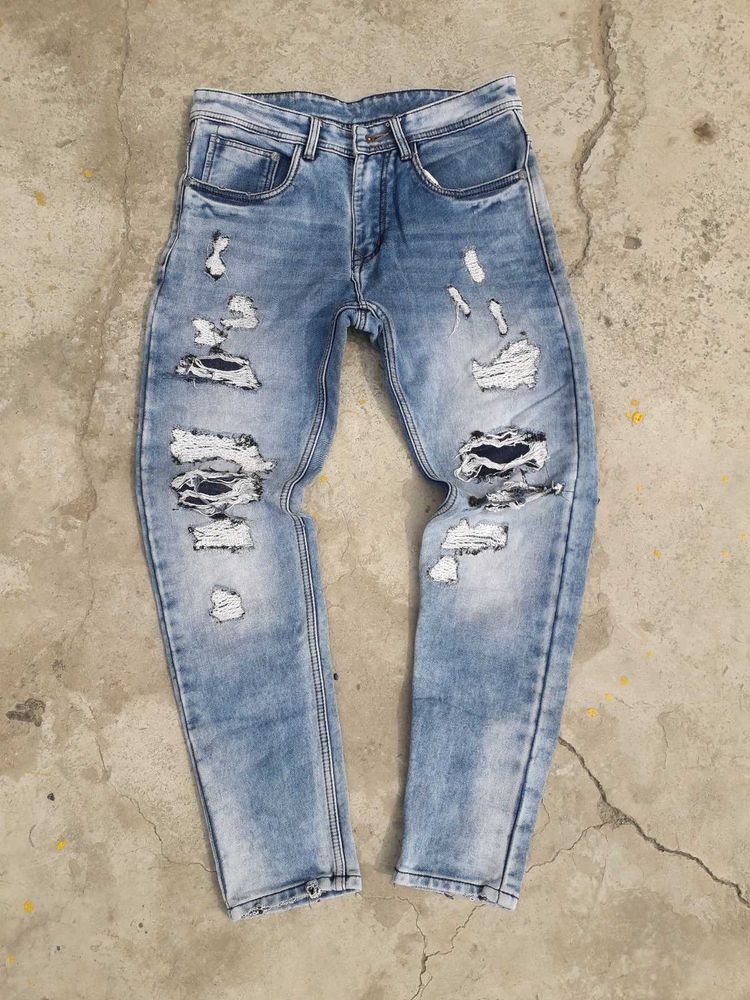 Distressed Blue Denim Jeans