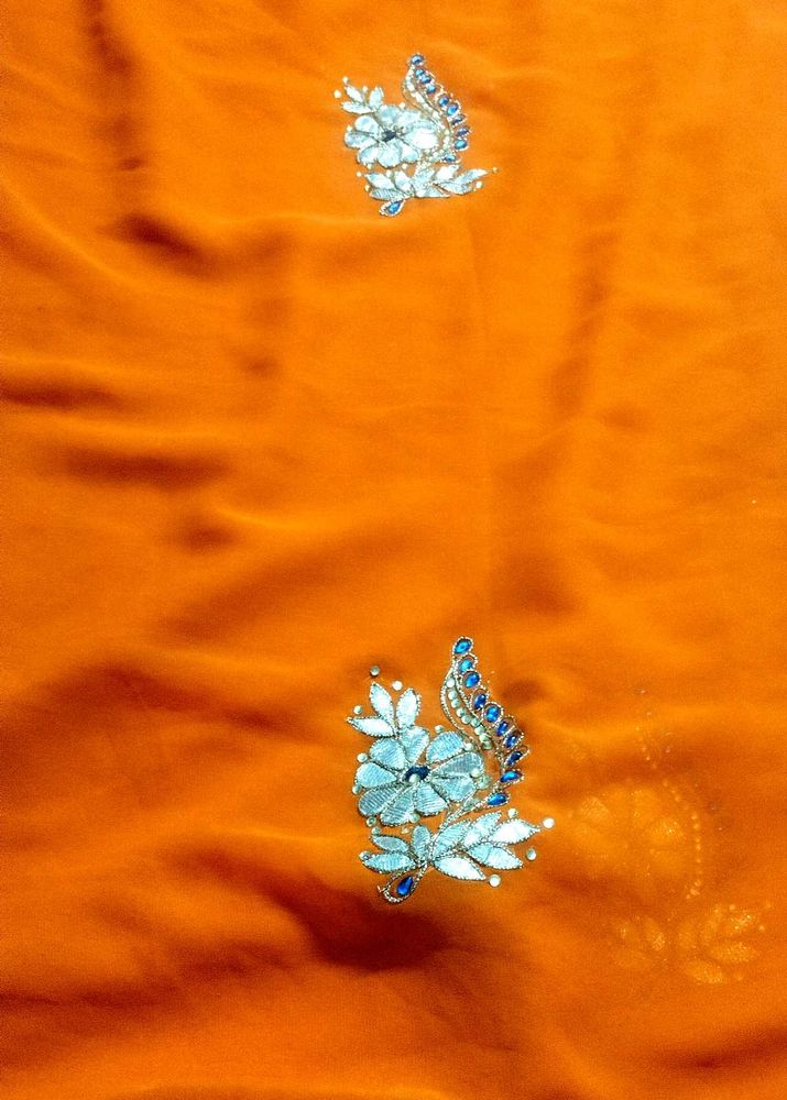 Vibrant Orange Embroidered Saree