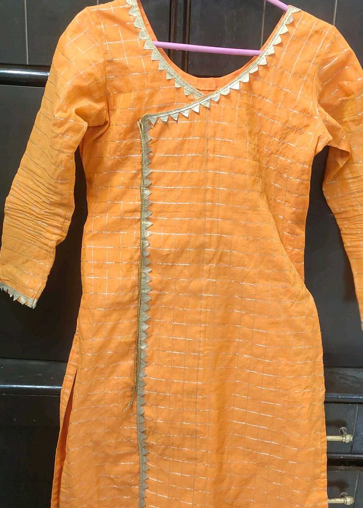 Orange kurta with golden border nakki lace