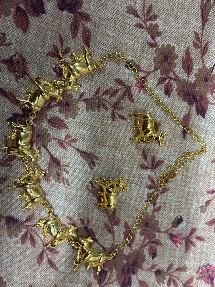 Gold-tone Nandi bell Necklace and Earring Set