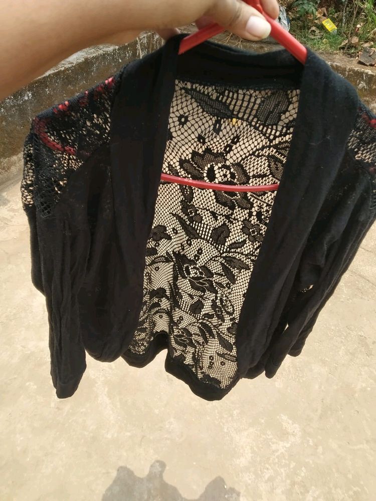 Shrug /Overzcoat Kind Of Clothing.