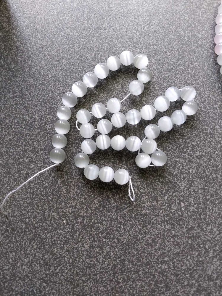 GLASS BEADS - Cat eye and Uv Light