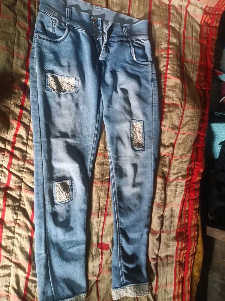 Distressed Denim Jeans