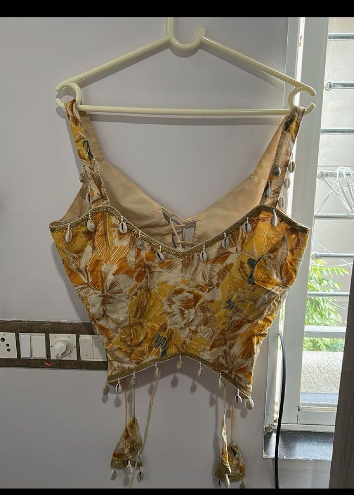 navaratri Yellow Floral Blouse with Shell Embellis