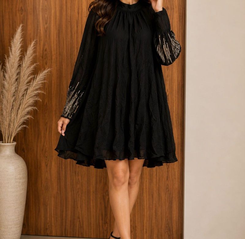Chic Black Dress with Embellished Sleeves