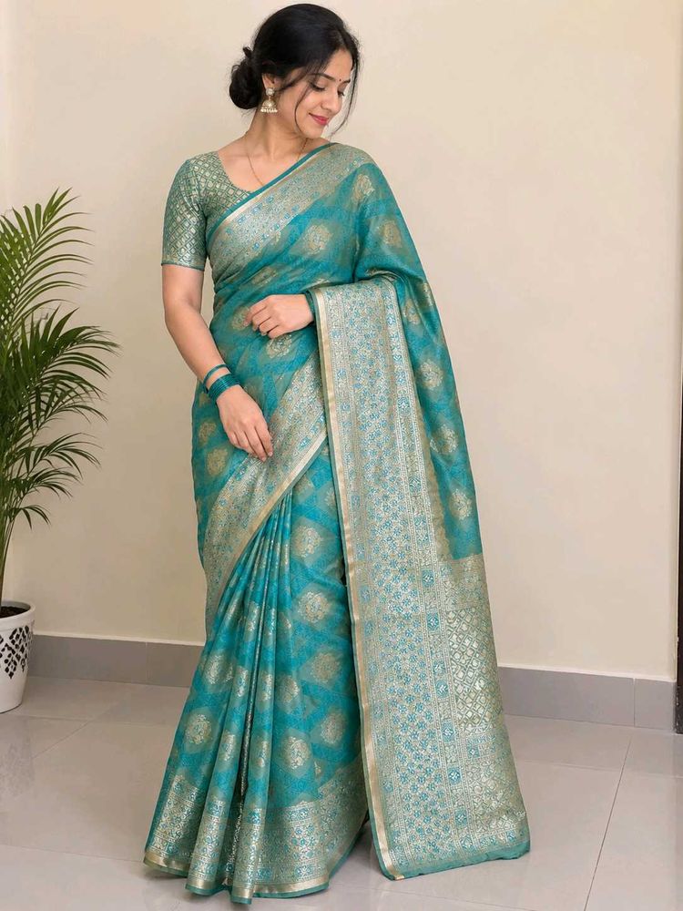 Elegant Teal Saree with Gold Brocade