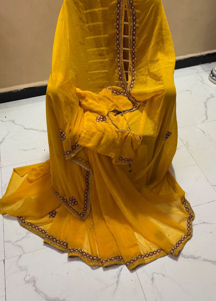 Vibrant Yellow pearl work  Saree