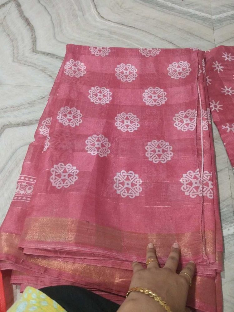 Elegant Pink Saree with White Motifs