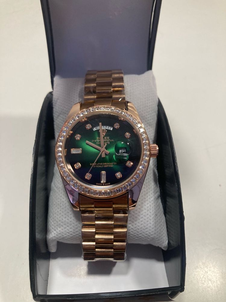 Rose Gold Rolex Watch with Green Dial