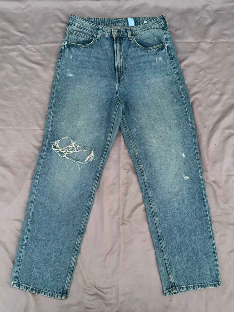 Distressed Blue Denim Jeans