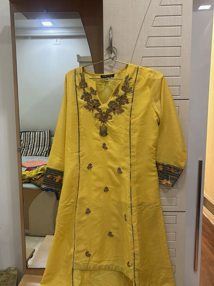 Yellow Embroidered kurta with skirt
