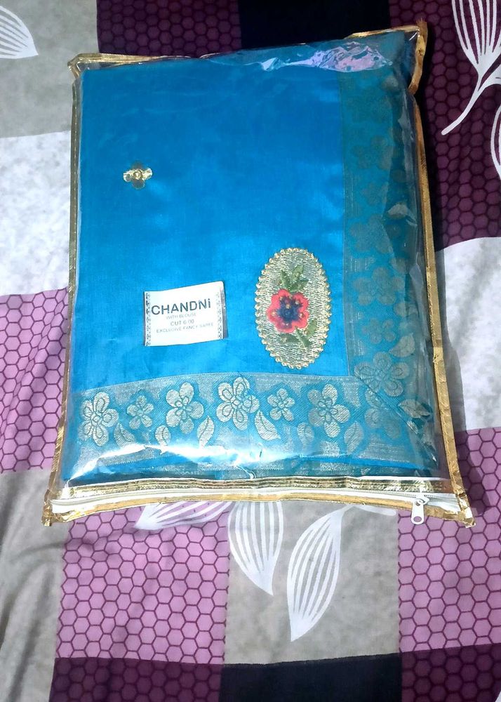 new Beautiful Teal Saree with Floral Border