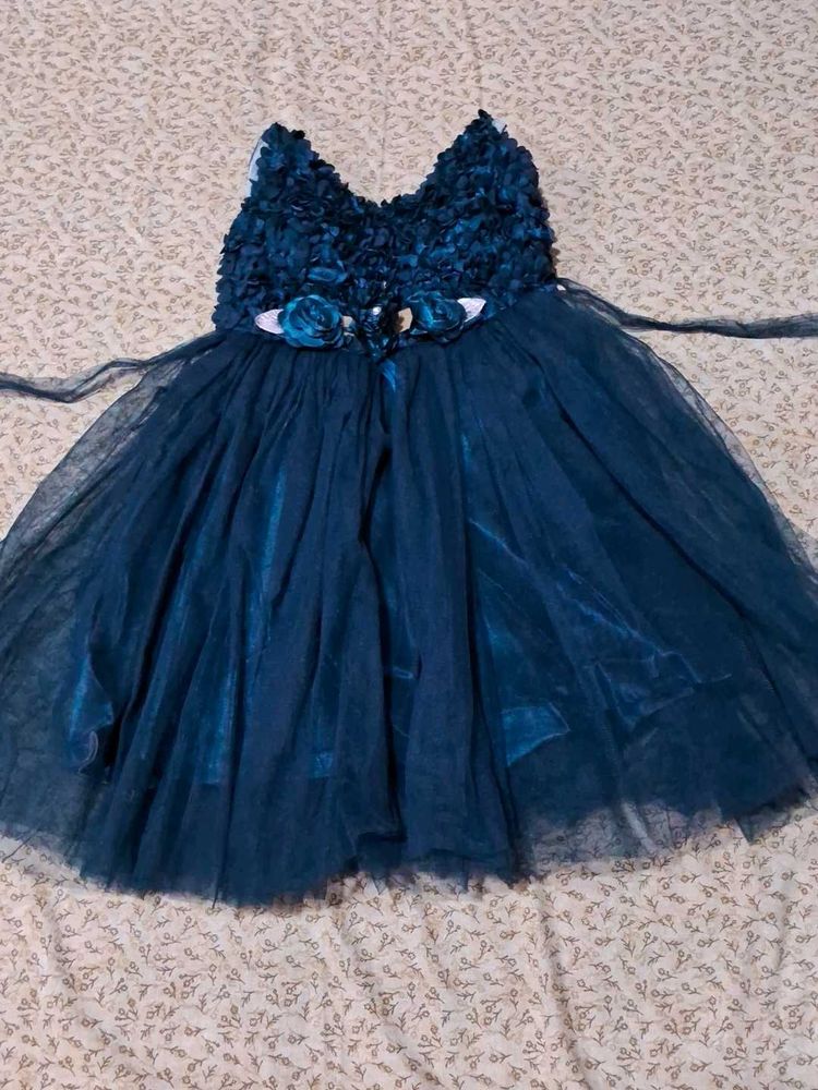 Stunning Teal Blue Gown with Floral Accents
