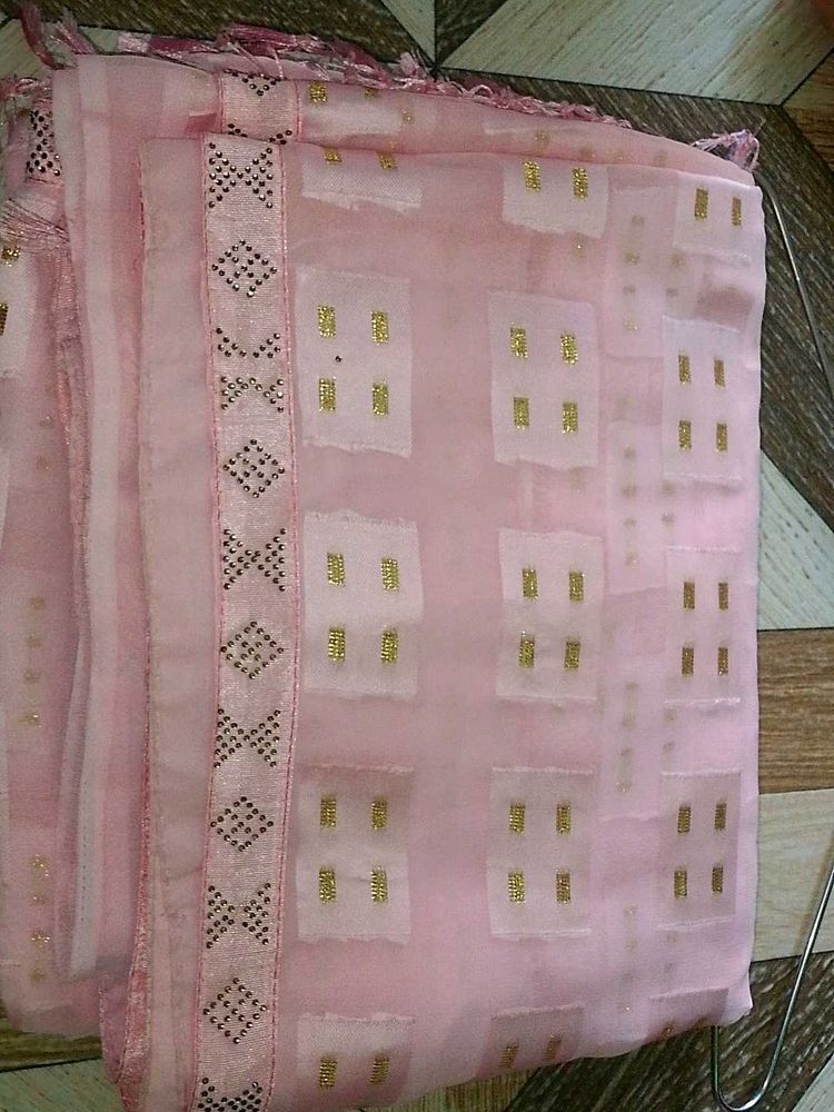 Elegant Pink Saree with Gold Embellishments