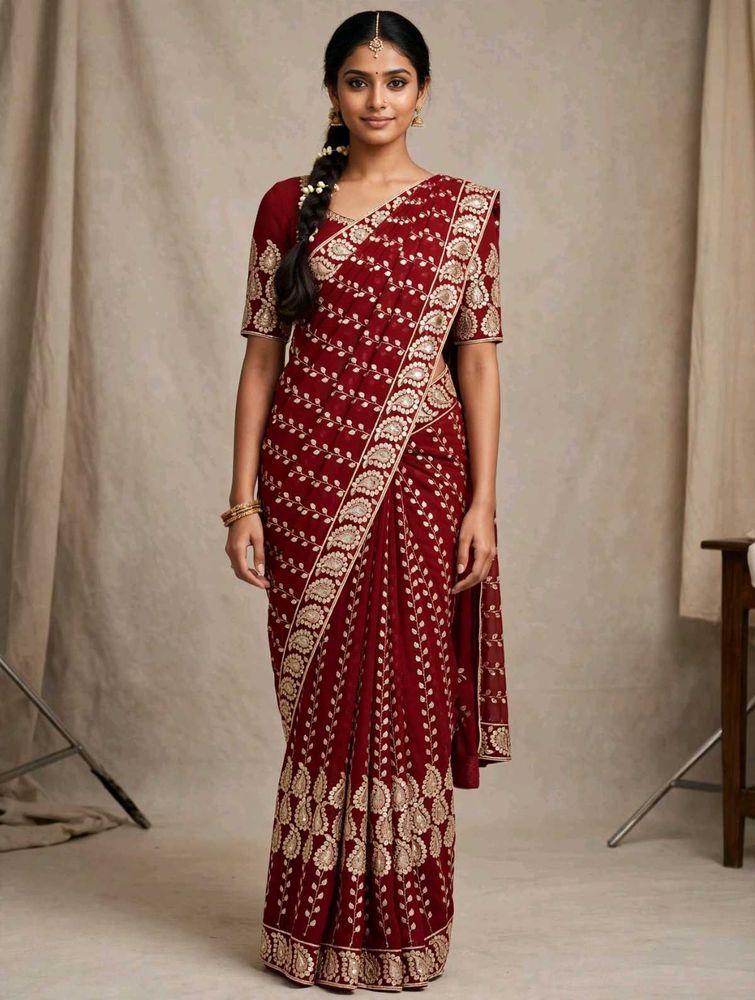 Elegant Maroon Embroidered Saree