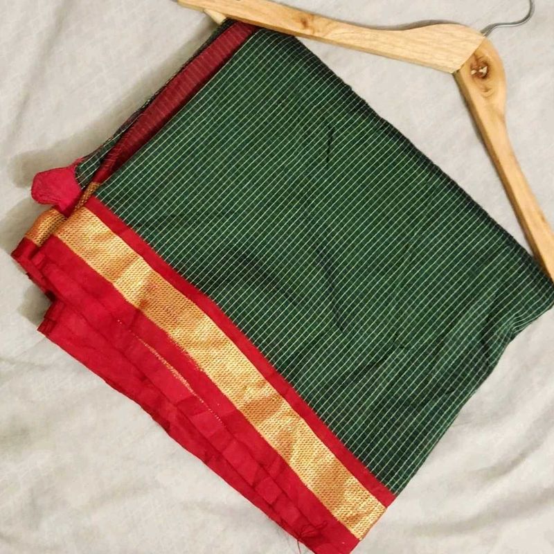 Elegant Green Saree with Red Border