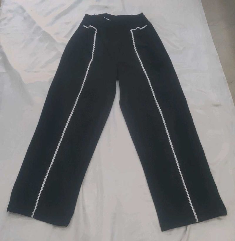 Chic Black Wide-Leg Pants with White Trim