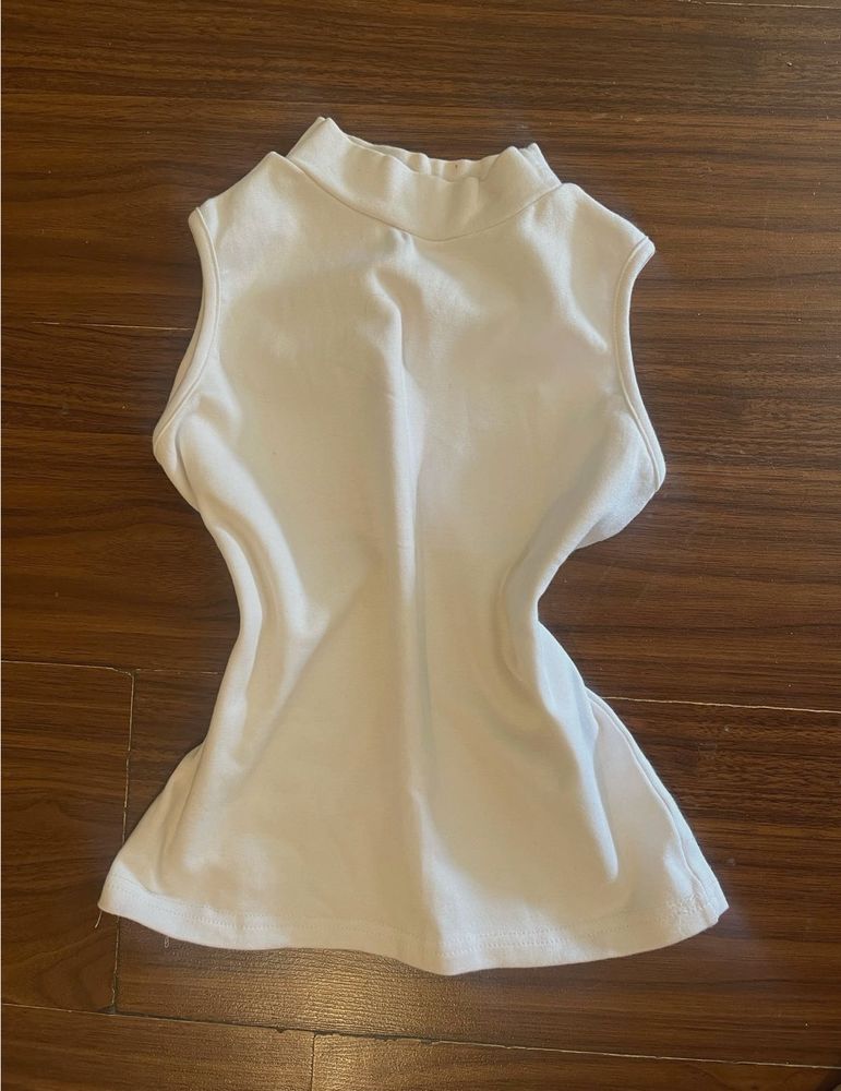 White fitted high-neck sleeveless top