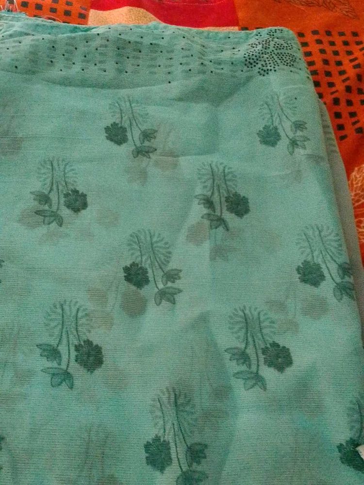 Elegant Teal Saree with Floral Print