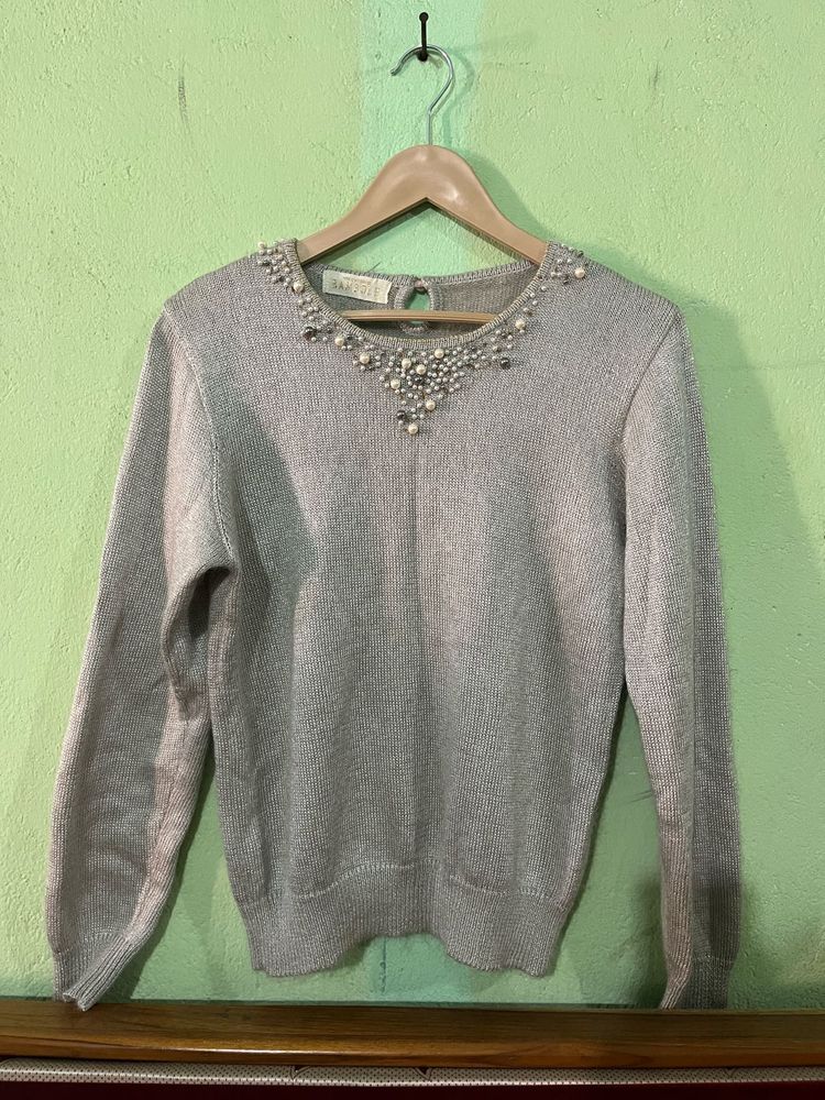 silver sweater with pearl and beaded embellishment