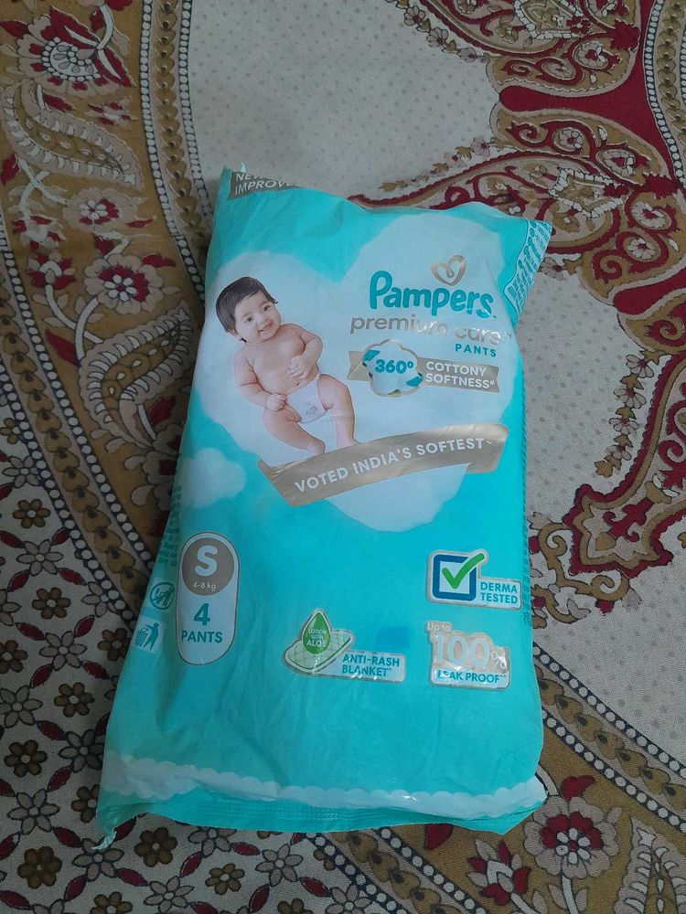 Pampers Premium with 1 pack of Feather Diapers
