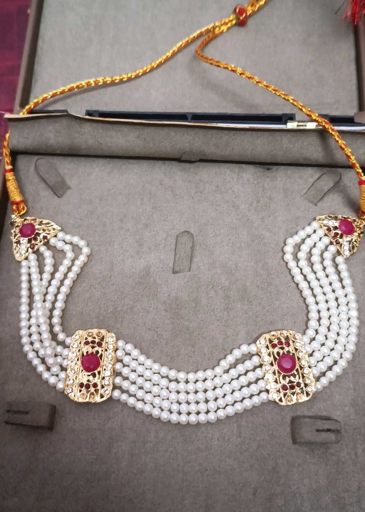 Exquisite Pearl Necklace with Ruby Accents