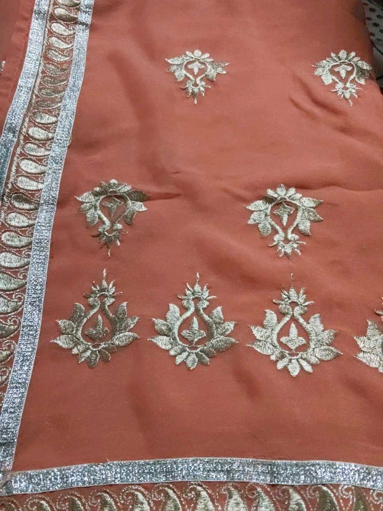 Elegant Embroidered Orange Saree