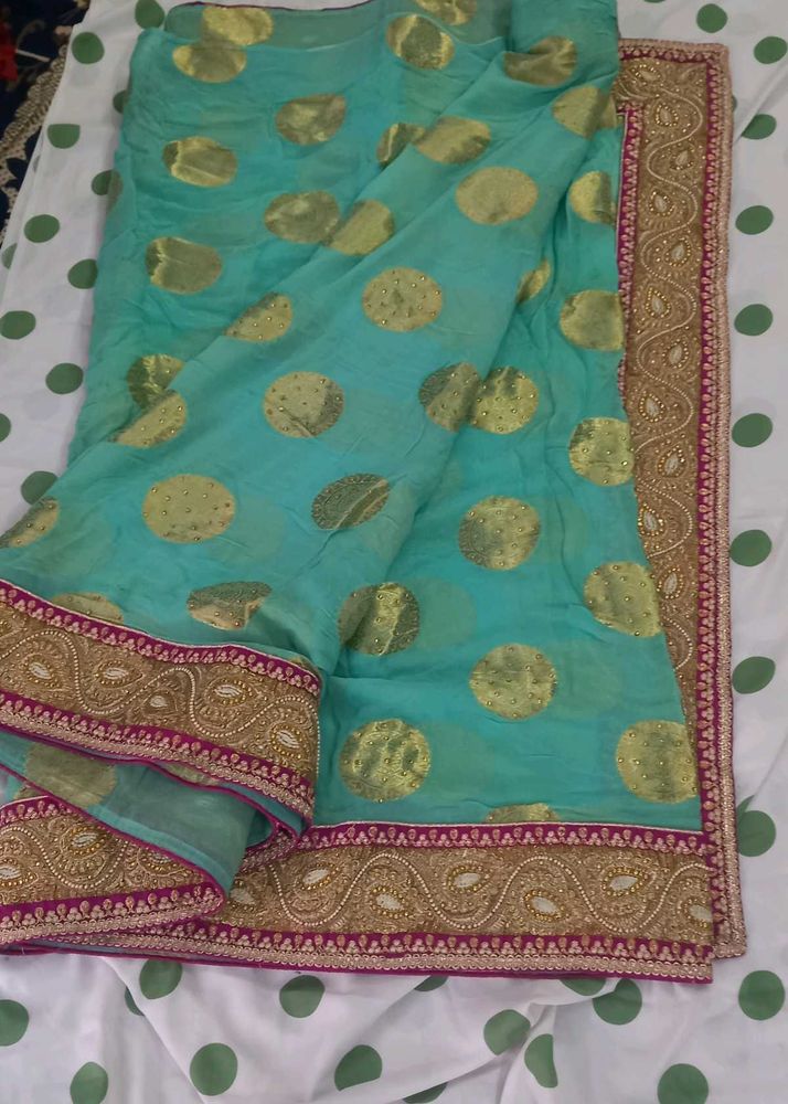 Beautiful Teal Saree with Gold Motifs