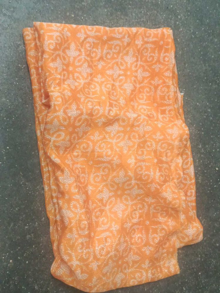 Orange blouse material with White Print