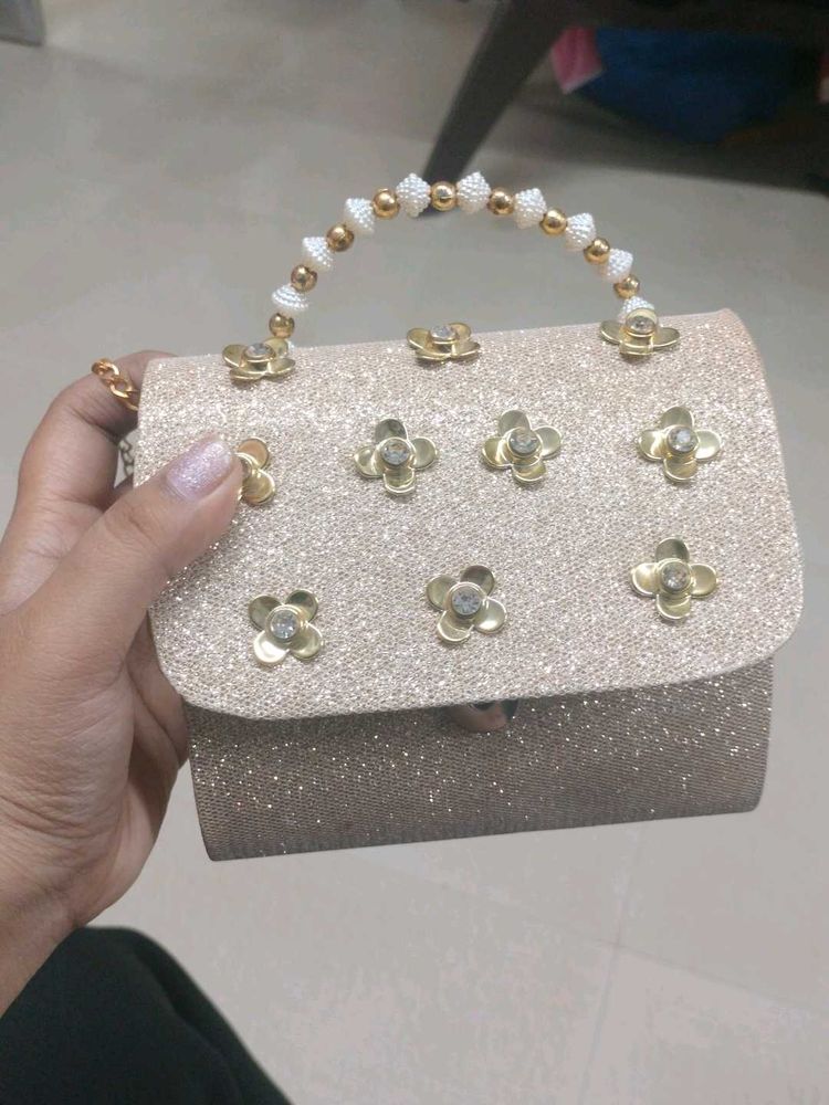 Sparkling Floral Clutch Bag
