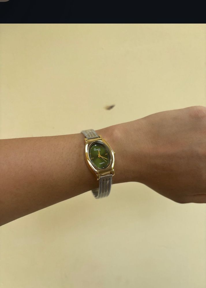 Elegant Gold Tone Green Dial Watch