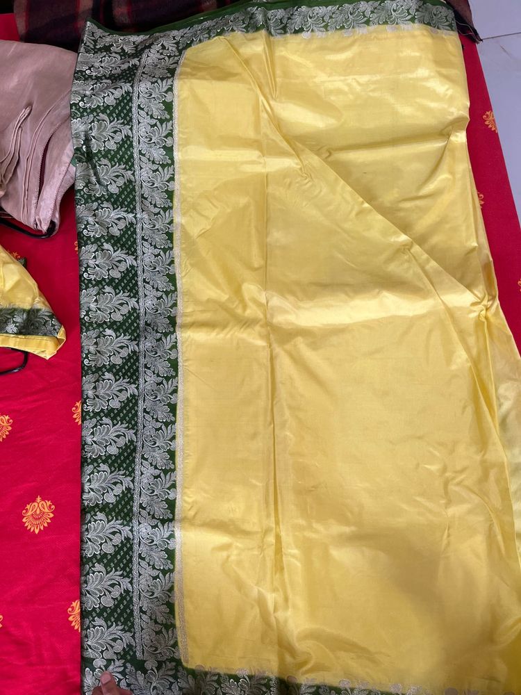 Beautiful Yellow Saree with Green Border