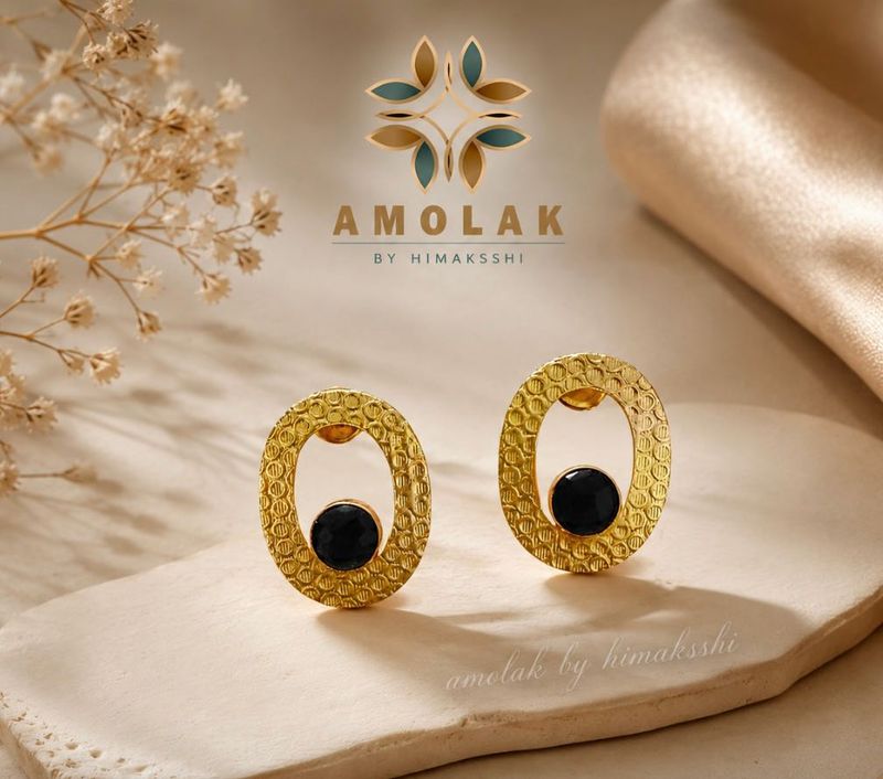 Elegant Gold Oval Earrings with Black Stone