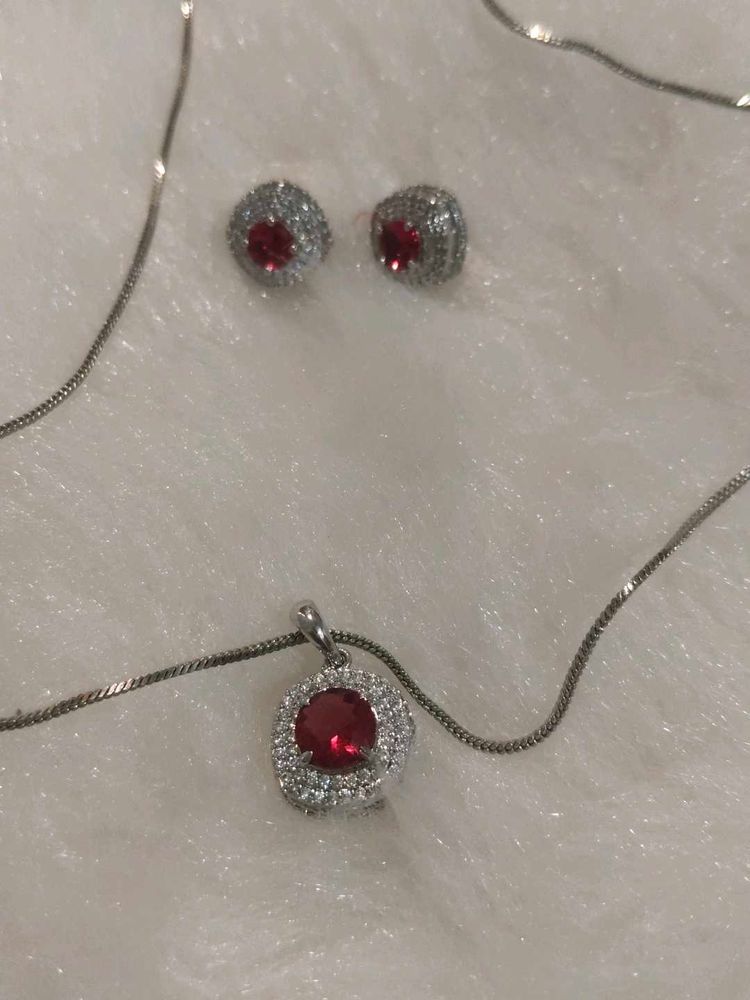 Diamond and ruby pendant set