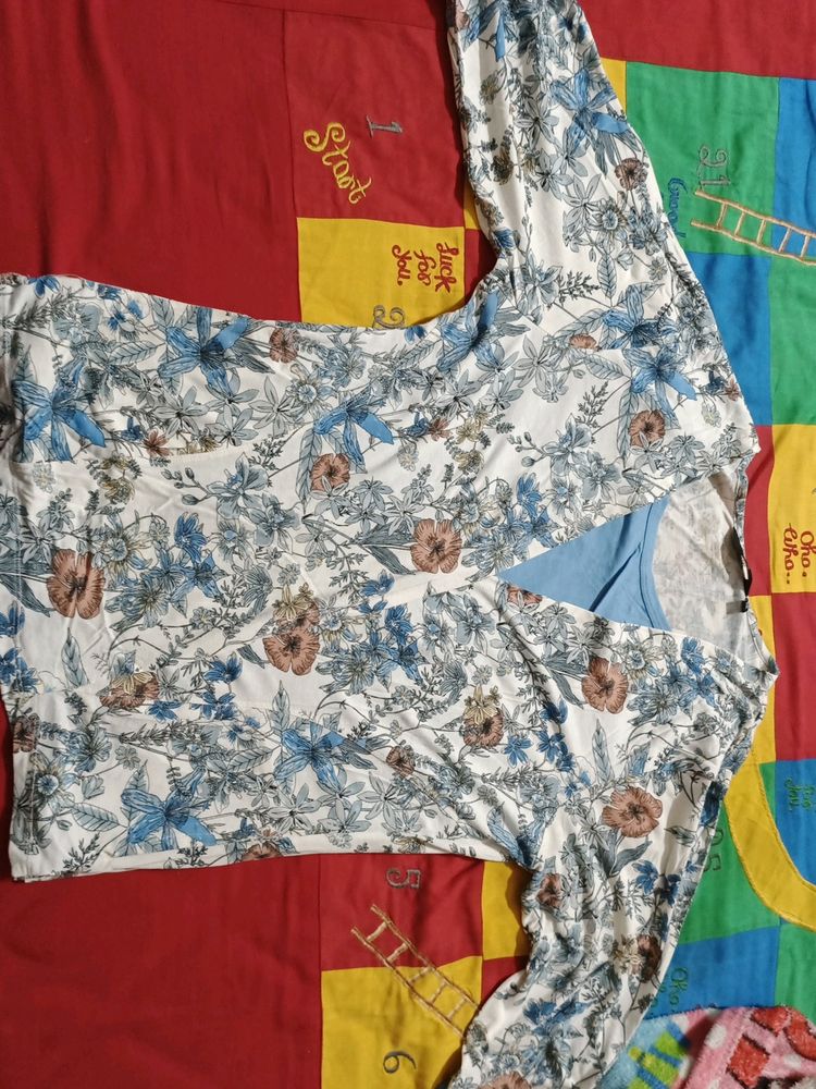 Blue coloured full sleeve printed top