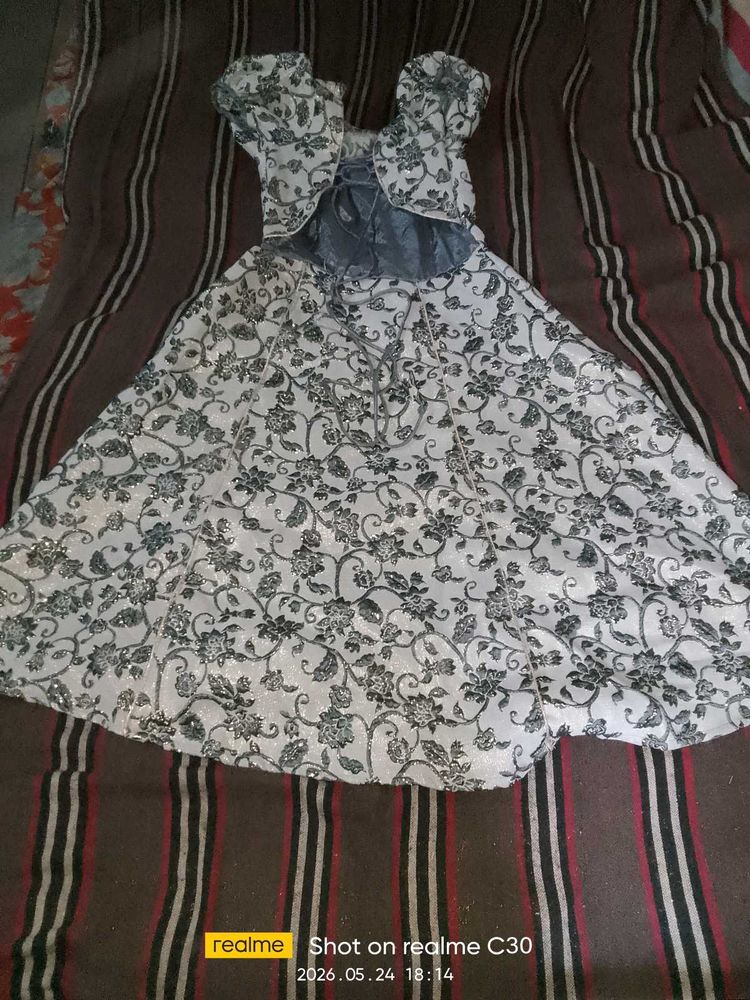 This is a 8-12 year girls gown .