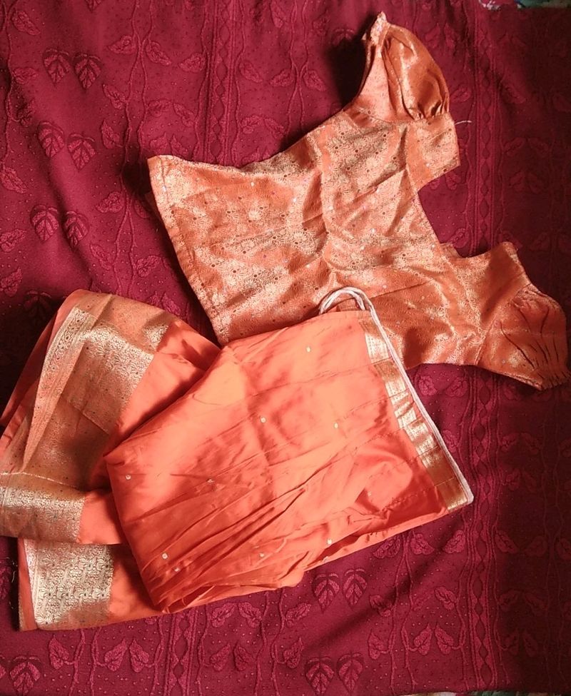 Orange Pattu Langa.with Paranda