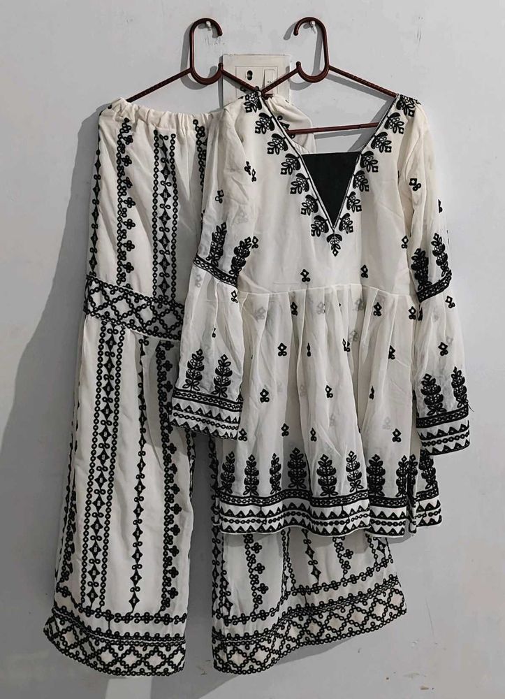 New Embroidered Peplum Set