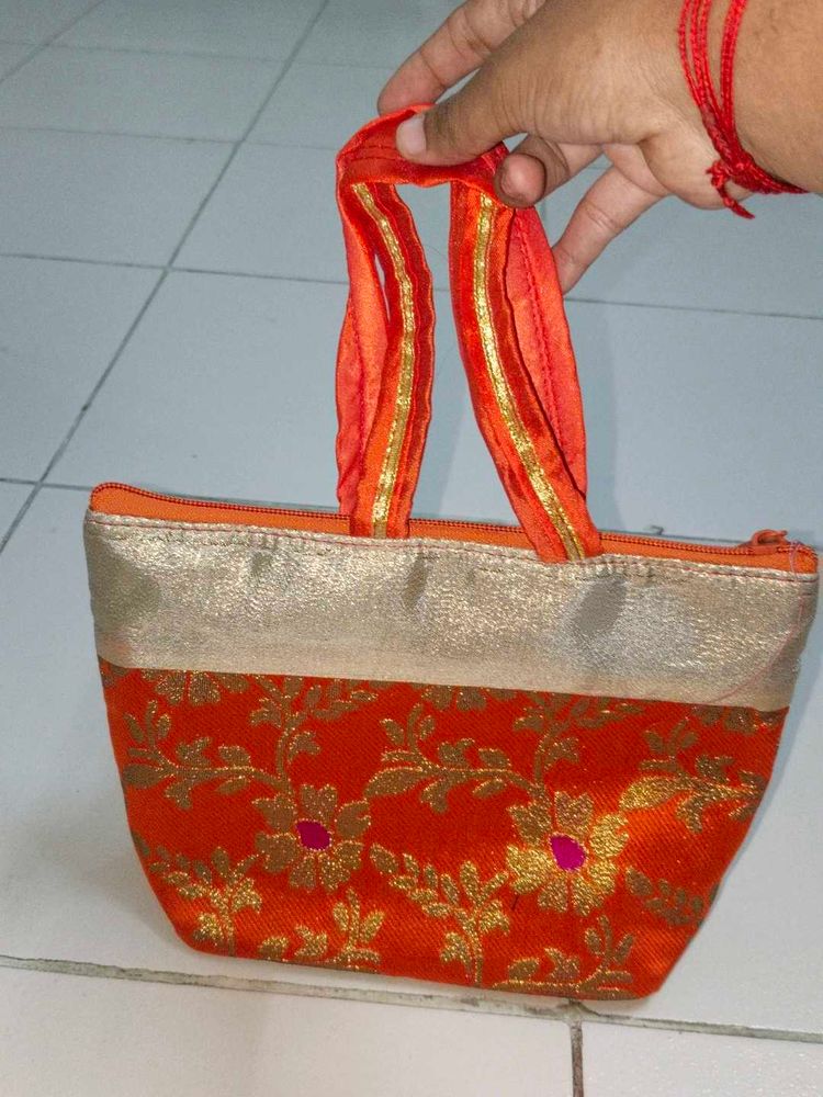 Orange Floral Pouch