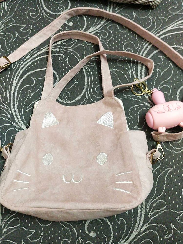 meow cat bag with chew toy keychain